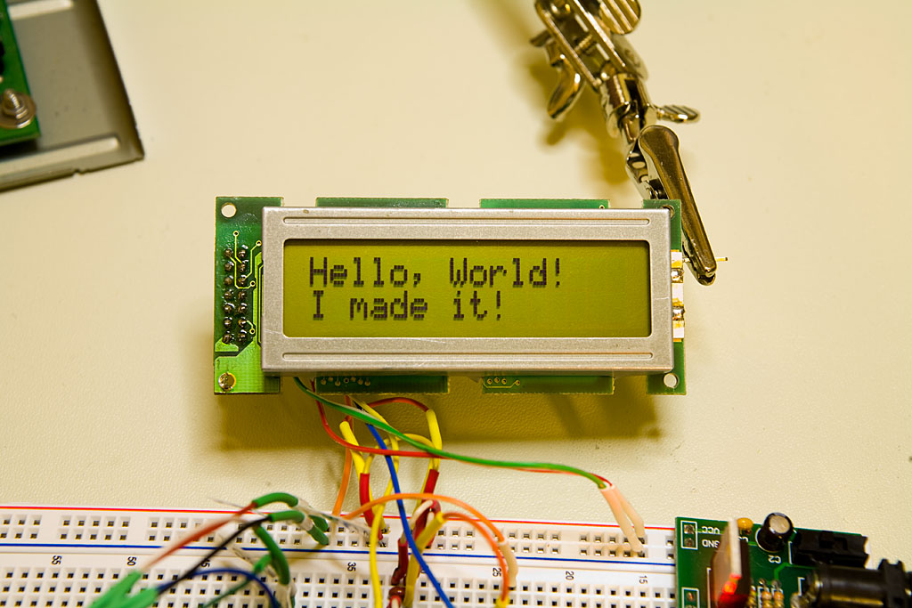 A HD44780-compatible LCD connected to a PIC via SPI